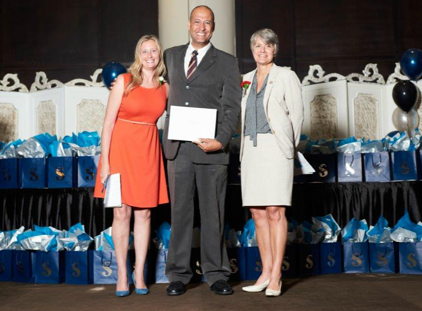 Danielle Weddepohl (Program Coordinator, Investigation – Public and Private Program, Sheridan College), Hildemar Timbo Martins Junior (award recipient), Colleen Arnold (Vice President, National Customer Service Excellence and Operations - Central & Atlantic Canada, GardaWorld)  