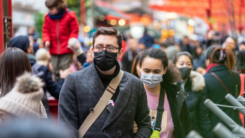 People wearing masks to protect themselves